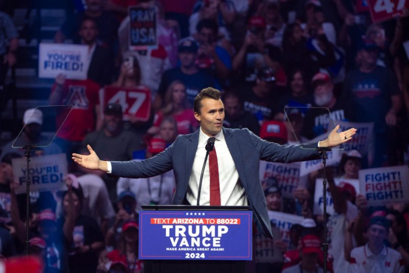 GLENDALE, ARIZONA - AUGUST 23: Turning Point USA Founder Charlie Kirk speaks during a campaign rally for Republican presidential nominee, former U.S. President Donald Trump at Desert Diamond Arena on August 23, 2024 in Glendale, Arizona. The rally, held in partnership with Turning Point PAC and Turning Point Action, comes come two weeks after Democratic presidential nominee U.S. Vice President Harris held a rally at the same location. (Photo by Rebecca Noble/Getty Images)