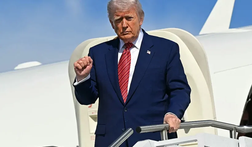 US President Donald Trump disembarks from Air Force One upon arrival at Morristown Municipal Airport in Morristown, New Jersey, May 23, 2025, as he travels to New Jersey for the weekend. Trump is going to Trump National Golf Club in Bedminster, New Jersey. (Photo by SAUL LOEB / AFP) (Photo by SAUL LOEB/AFP via Getty Images)