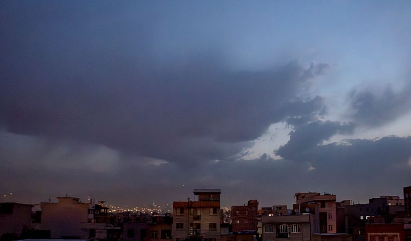 A view of the skyline of Tehran, Iran at night on June 13, 2025. Israel launched a series of coordinated airstrikes into Iranian territory, marking the start of a broader campaign aimed at disabling Tehran's nuclear facilities, ballistic missile capabilities, and military leadership. The Israeli Defense Forces confirmed that multiple fighter jets struck "dozens" of strategic military sites, triggering at least ten explosions. In retaliation, Iran reportedly launched a swarm of drones toward Israeli territory, which Israel claimed to have intercepted. (Photo by Hossein Beris / Middle East Images via AFP) (Photo by HOSSEIN BERIS/Middle East Images/AFP via Getty Images)
