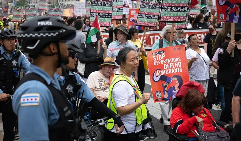 CHICAGO, ILLINOIS - JUNE 12: Hundreds of immigrant rights protestors march through the Loop on June 12, 2025 in Chicago, Illinois. The protest is one of many taking place across the country as the Trump administration pushes to increase apprehensions of immigrants. (Photo by Scott Olson/Getty Images)