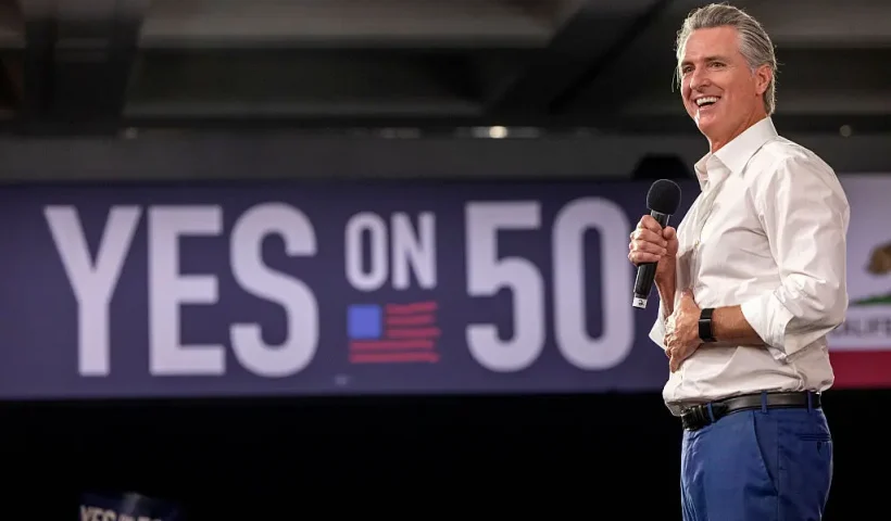 LOS ANGELES, CALIFORNIA - NOVEMBER 1: California Governor Gavin Newsom speaks at a "Yes On Prop 50" volunteer event at the LA Convention Center on November 1, 2025 in Los Angeles, California. California's Prop 50 is on the ballot to either authorize or deny temporary changes to congressional district maps. Election Day is November 4th. (Photo by Jill Connelly/Getty Images)