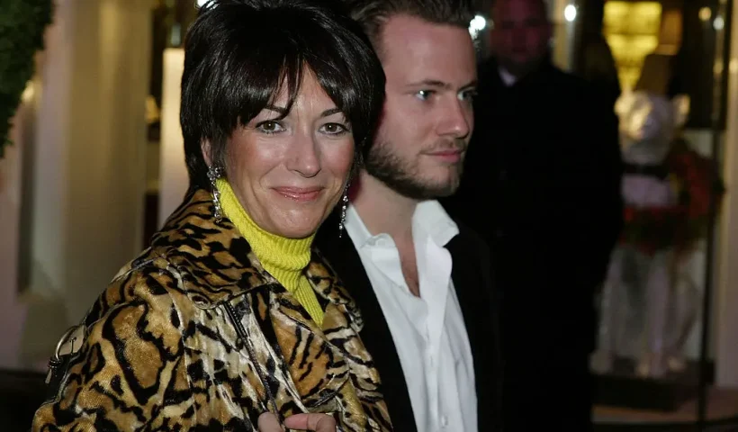 NEW YORK - DECEMBER 8: Socialite Ghislane Maxwell with an unidentified male companion attends the Opening of the Asprey Flagship Store on 5th Avenue December 8, 2003 in New York City. (Photo by Mark Mainz/Getty Images)