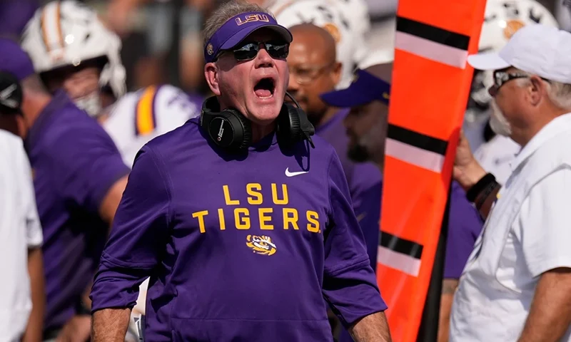 LSU head coach Brian Kelly yells to an official during the second half of an NCAA college football game against Vanderbilt, Saturday, Oct. 18, 2025, in Nashville, Tenn. (AP Photo/George Walker IV)