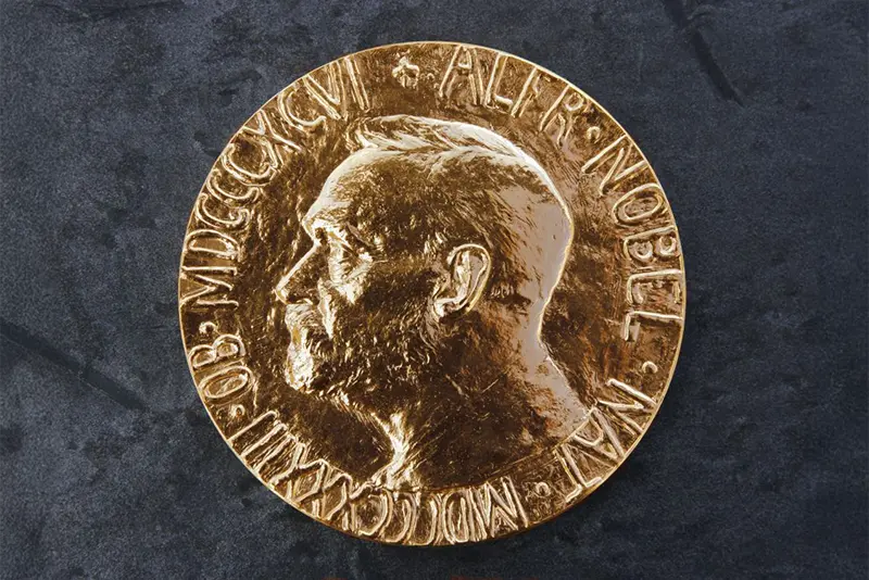 A photo taken 08 October 2004 in Oslo shows the Nobel Peace Prize medal. (Photo by Gunnar Lier / NTB / AFP) (Photo by GUNNAR LIER/NTB/AFP via Getty Images)