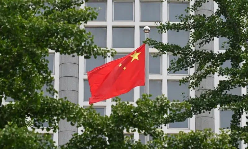 The Chinese national flag flies outside the Ministry of Foreign Affairs in Beijing on July 26, 2023. (Photo by GREG BAKER / AFP) (Photo by GREG BAKER/AFP via Getty Images)