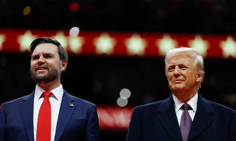WASHINGTON, DC - JANUARY 20: U.S. Vice President J.D. Vance and U.S. President Donald Trump watch during an indoor inauguration parade at the Capital One Arena on January 20, 2025 in Washington, DC. Donald Trump takes office for his second term as the 47th president of the United States. (Photo by Anna Moneymaker/Getty Images)