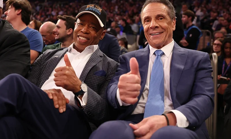 NEW YORK, NEW YORK - OCTOBER 22: New York Mayor Eric Adams poses with Independent candidate former New York Gov. Andrew Cuomo after Cuomo participated in the second debate for the upcoming mayoral election on Wednesday evening during the game between the New York Knicks and the Cleveland Cavaliers at Madison Square Garden on October 22, 2025 in New York City. NOTE TO USER: User expressly acknowledges and agrees that, by downloading and or using this photograph, User is consenting to the terms and conditions of the Getty Images License Agreement. (Photo by Al Bello/Getty Images)