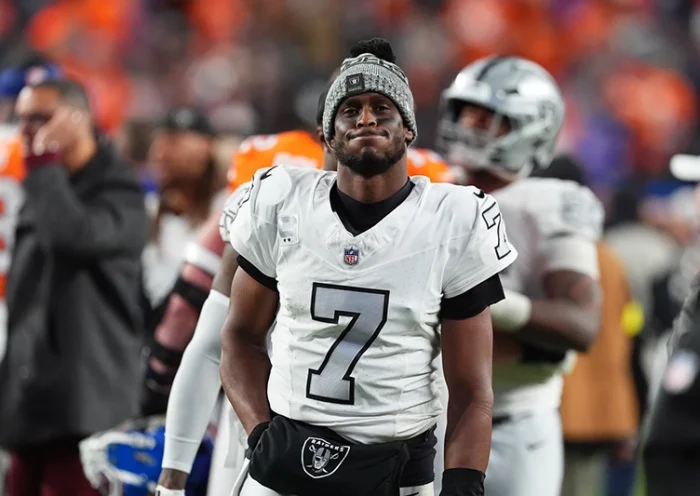 Las Vegas Raiders quarterback Geno Smith heads off the field after an NFL football game against the Denver Broncos, Thursday, Nov. 6, 2025, in Denver. (AP Photo/David Zalubowski)